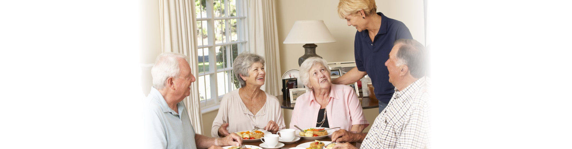 caregiver preparing food for seniors